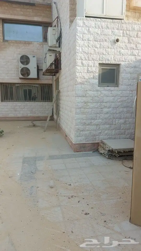 ازاله الصبغ القديم بالرمل وتخشين خرسانه 4