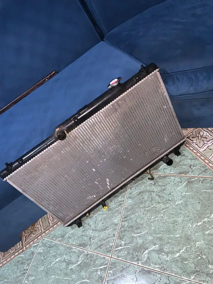 للبيع راديتر كامري2003جديد 1