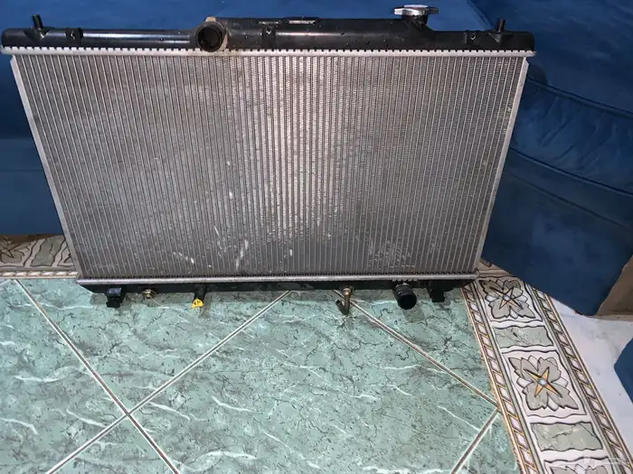 للبيع راديتر كامري2003جديد 4