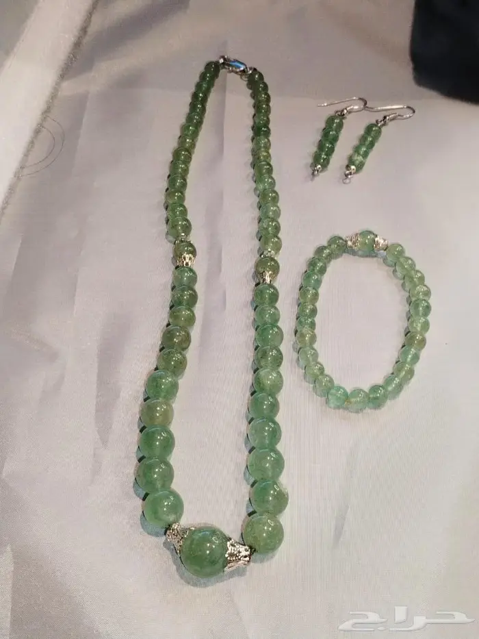 طقم نسائي من حجر الزمرد الزامبي 0