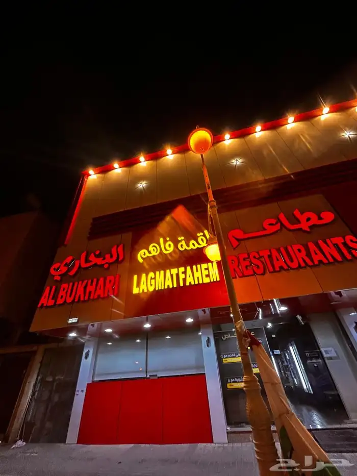 خطاط لوحات محلات وأسوار مشاريع 12