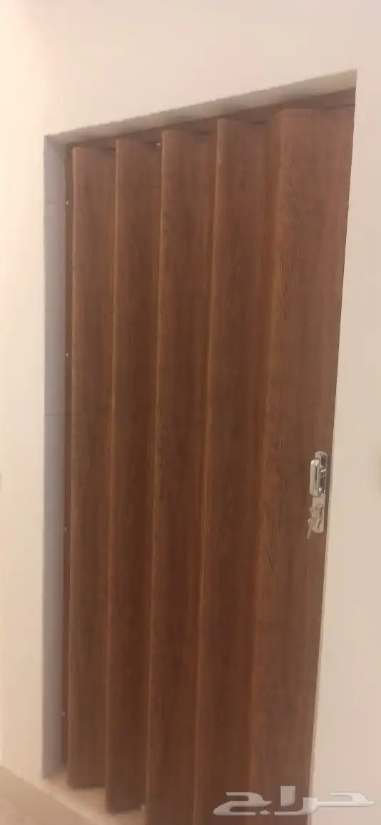 ابواب سحب سحاب جلد وبلاستيك كورديون 1