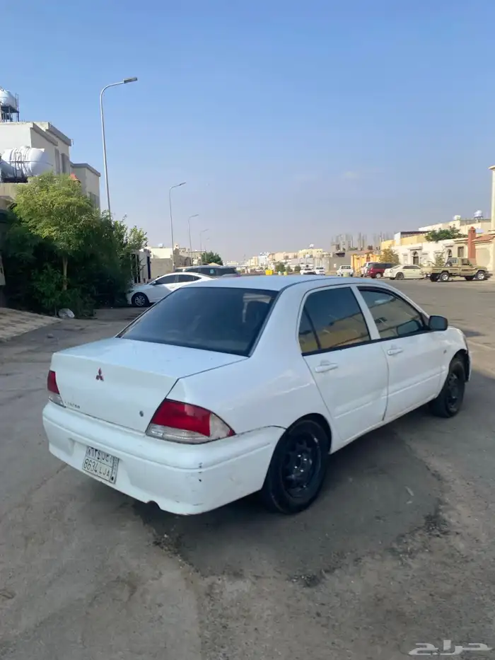 ميتسوبيشي لانسر 2002 4