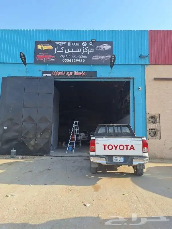 خطاط لوحات محلات 2