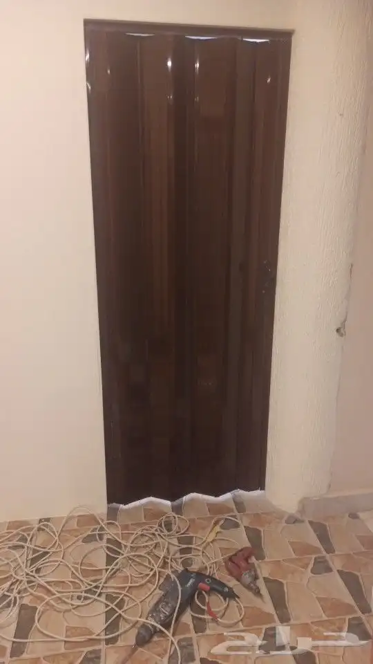 ابواب سحب سحاب جلد وبلاستيك كورديون 0