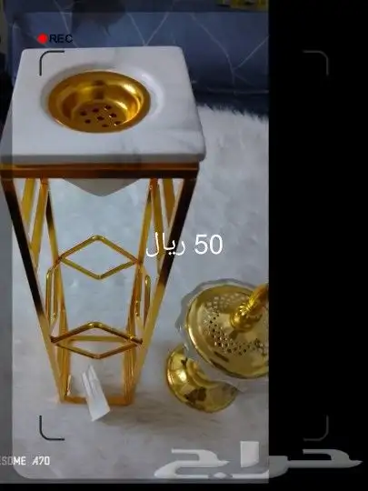 أجهزة للشعر وخداديات للرقبة ومباخر وساعة حايط 5