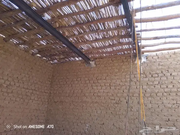 مباني تراث حجر وطين وسقواف وترميمت البيوت القديمه وتليوست لل 7