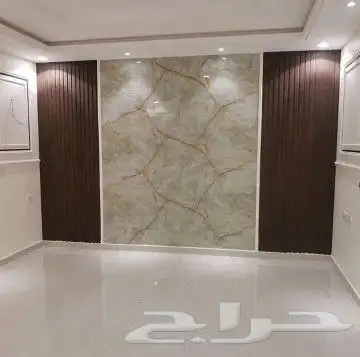 تصميم وديكور جميل لجدران المنزل وتلفزيون جميل على الجدران 8