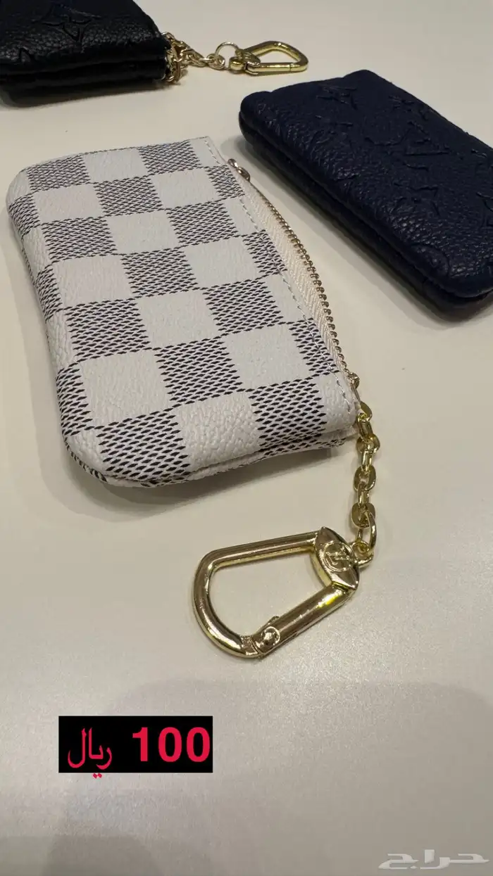 ميدالية مفاتيح كوبي LV 3