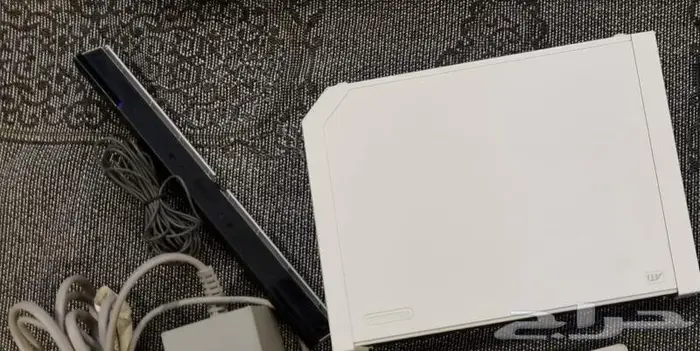 جهاز وي مستخدم مع اغراضه وبورد Wii fit 5