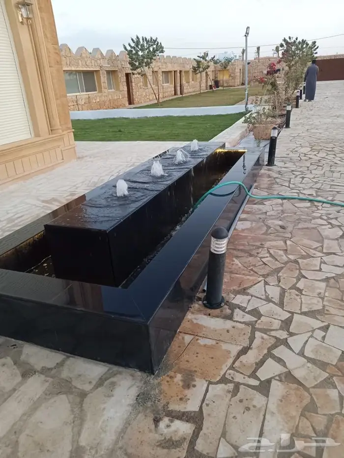 عشب صناعي ونجليه طبيعي 8