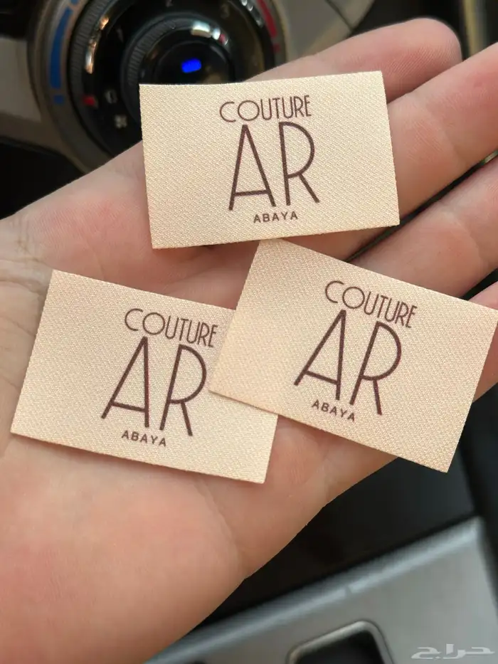 طباعة ليبل قماش للعبايات لوقو جلد بكجات عبايات 4