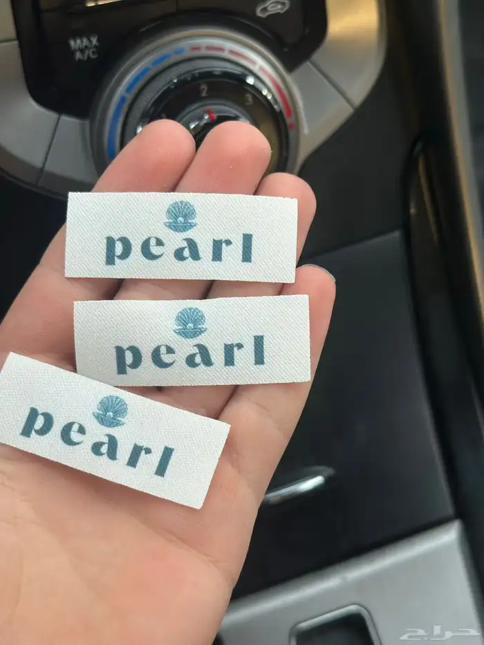 طباعة ليبل قماش للعبايات لوقو جلد بكجات عبايات 8