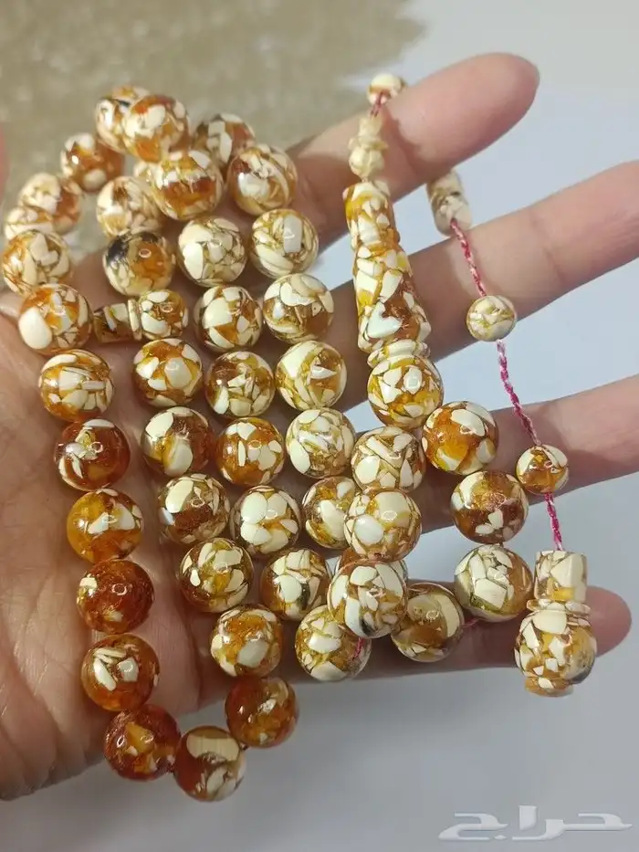 سبحة فاخرة من كسر العاج الطبيعي والكهرمان الطبيعي 0