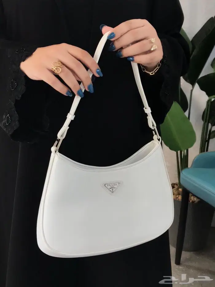 شنط ثلاث ماركات من فخامة شنطة برادا مع توري بورش سيلين PRADA 18