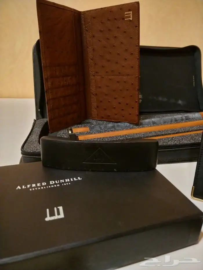 تصفية قطعتين دنهل محفظة جلد نعام ومضرب قولف دنهل اصلي فنتج 0