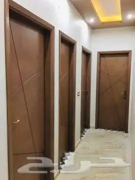 معلم دهانات الابواب الخشب ودهانات الحوائط 3