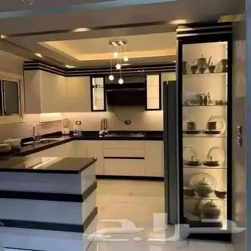 خشب ودواليب ملابس ومطابخ صاج والمنيوم ورخام صناعي 2