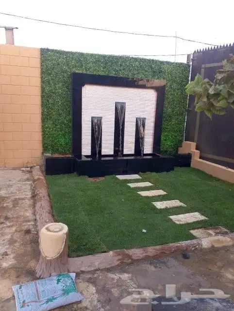 تنسيق حدائق ثيل طبيعي وتمديد شبكات الري 5