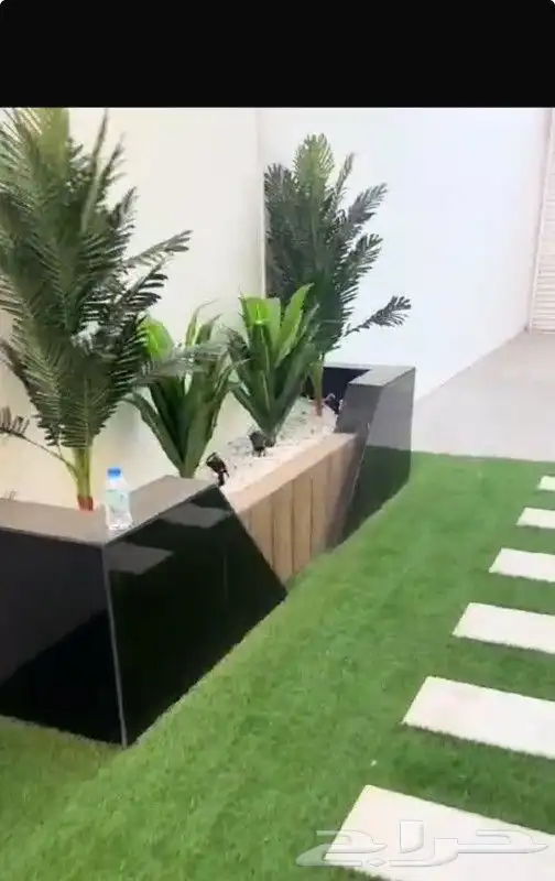 تنسيق حدائق ثيل طبيعي وتمديد شبكات الري 6