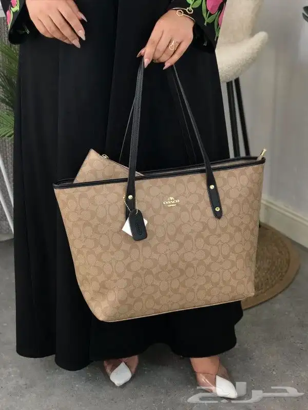 شنط ماركة كوتش جديد دبل فيس 13