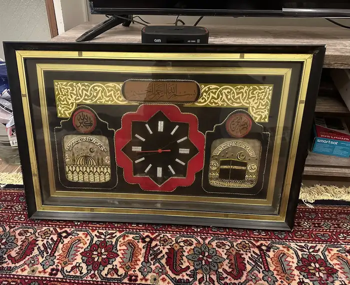 ساعه تراثية حائط 0