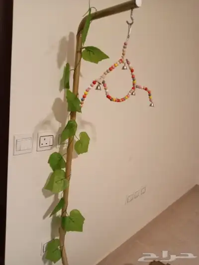 علاقي لقفص الطيور 0