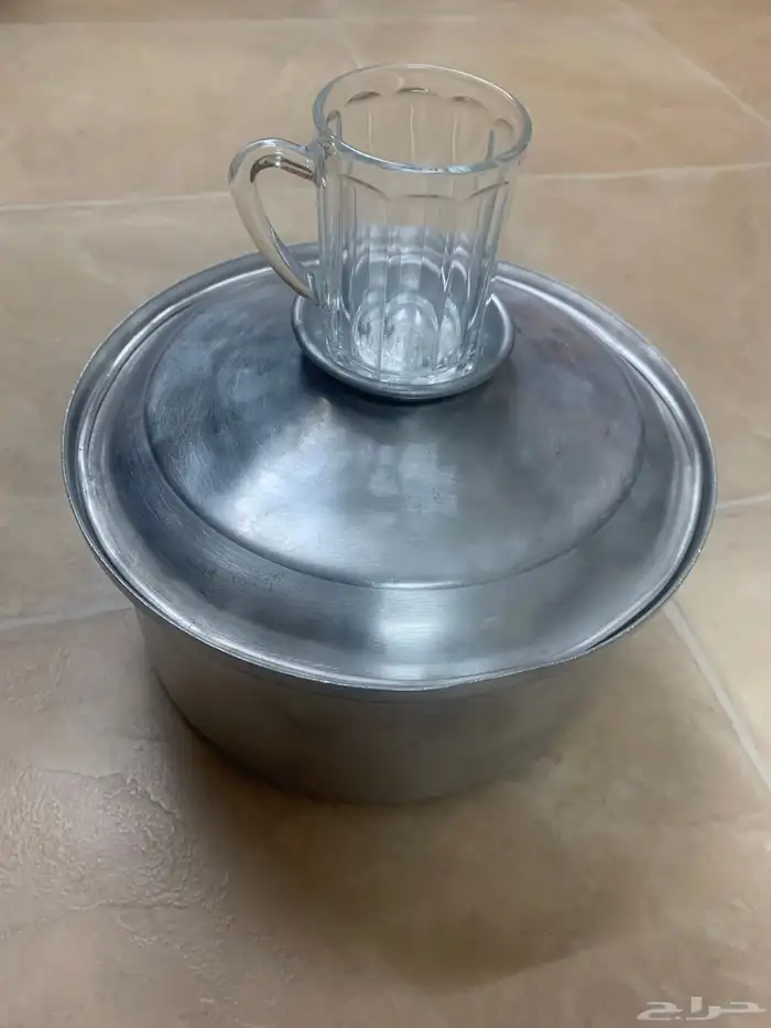 دلة وابريق وقدر ختمين و غضارة 17