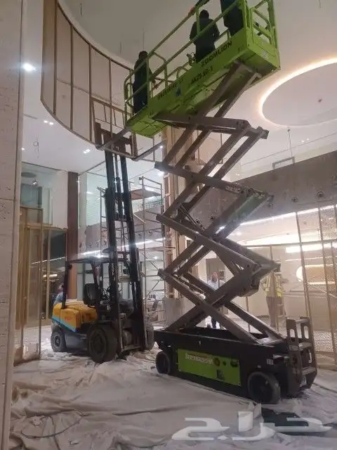 رافعه مقصيه للإيجار. كرينات. بوم تراك. رافعات عمال. 1