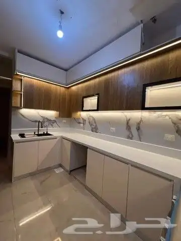 مطابخ خشب ألماني ومطابخ صاج والمنيوم ورخام صناعي وبورسلان 2