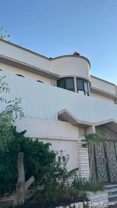 موقع رائع في السداد عليه مبنى فيلا قديمه 360م شارع 15 6