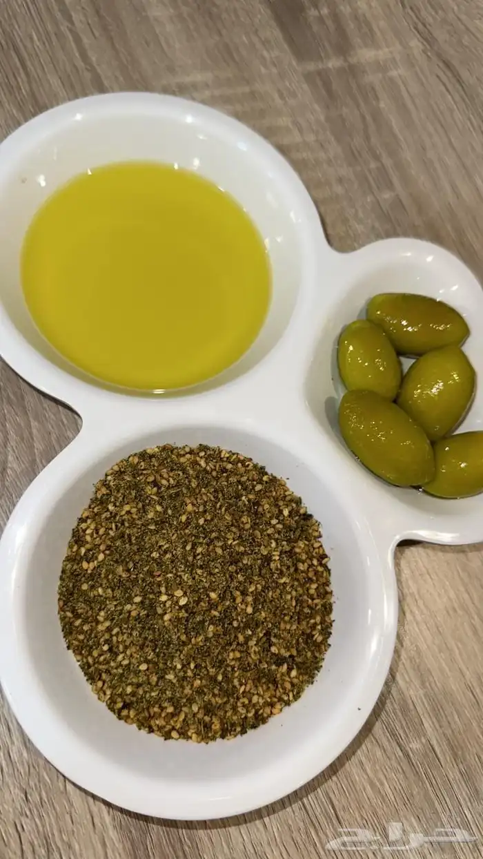 زيت زيتون نخبة الزيتون 1446 جديد عصره اولى مضمون شرط 7