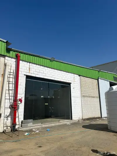 مستودع بمبنى إداري للايجار بحي النخيل 37