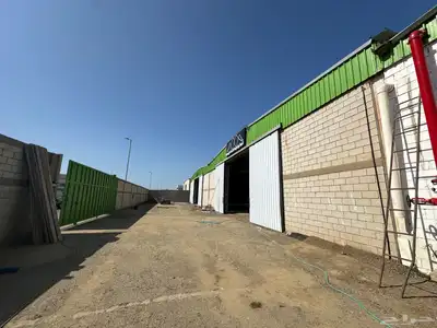 مستودع بمبنى إداري للايجار بحي النخيل 11