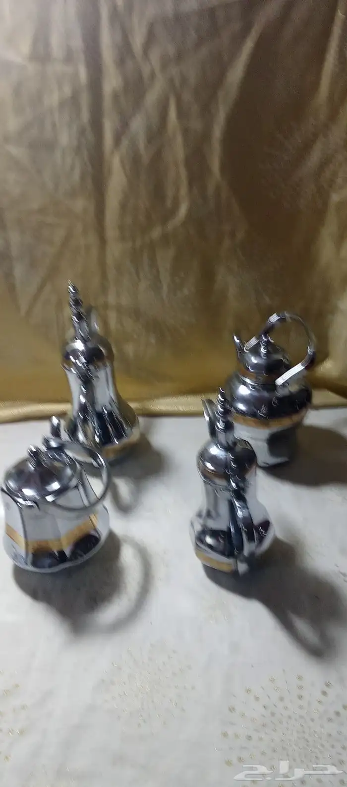 طقم دلال واباريق صناعة كورية ستاليس ستيل اصدار قديم 6