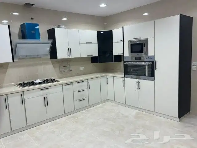 مطابخ خشب ألماني ومطابخ صاج والمنيوم ورخام صناعي وبورسلان 1