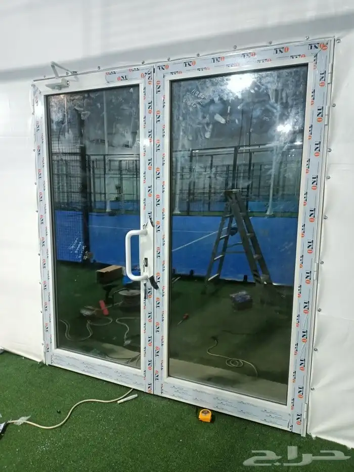 المنيوم ابواب شبابيك واجهات شورات وسكوريت 1