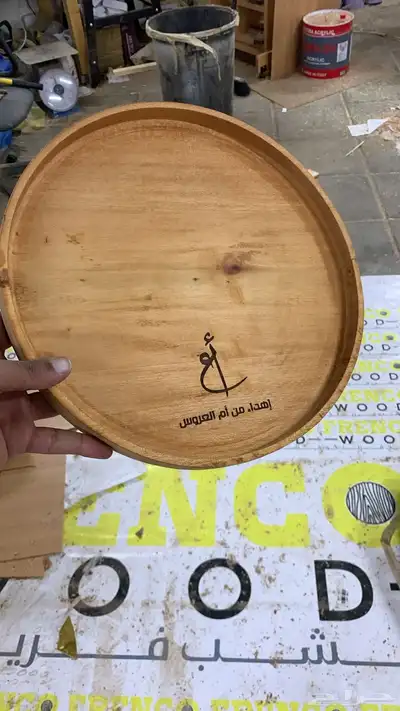 صواني خشبية مع نحت الشعار 7