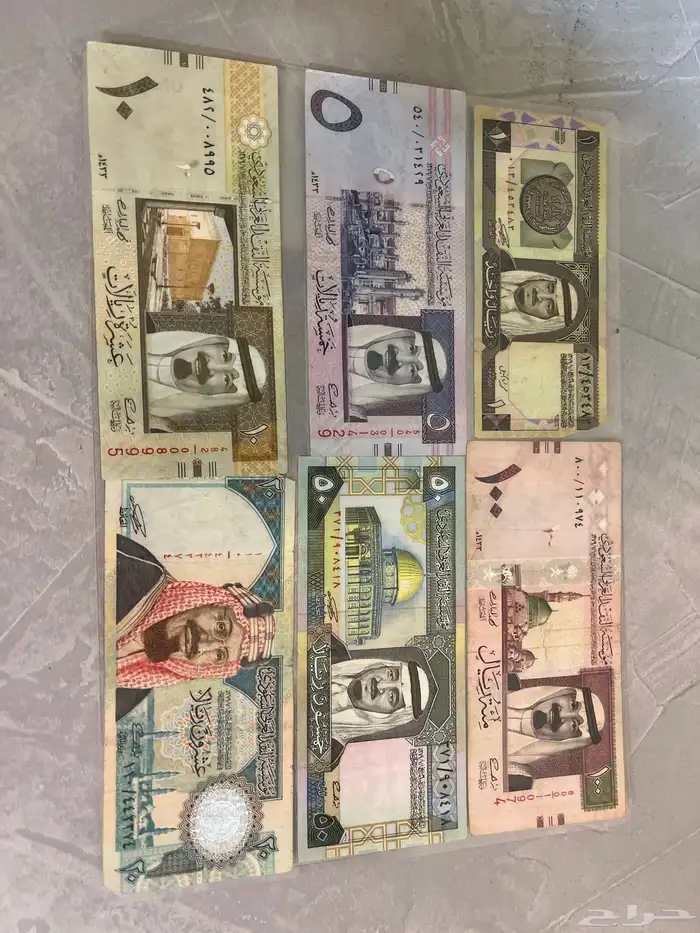 فلوس نقدية قديمة وجامده وبلوت صدام جديده ما انفكت وقديمه 0