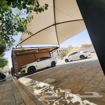 مظلات وسواتر نيوم 22