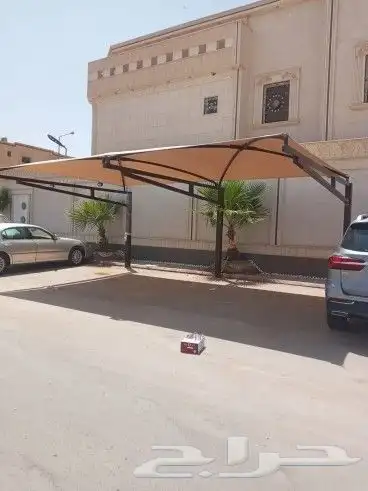 مظلات وسواتر نيوم 5