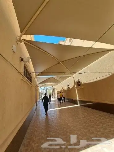 مظلات وسواتر نيوم 9
