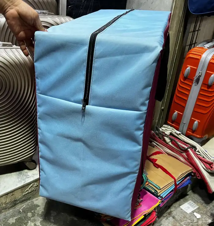 شنط تخزين ملابس وبطانيات 0