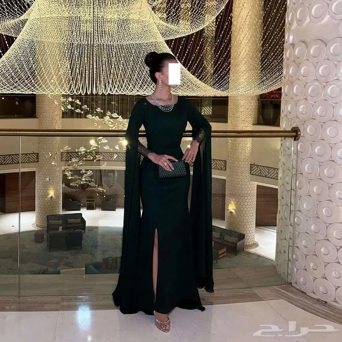 فستان الأخضر الزيتي طويل و أنيق فساتين تتميز بتصميمها الفريد 2