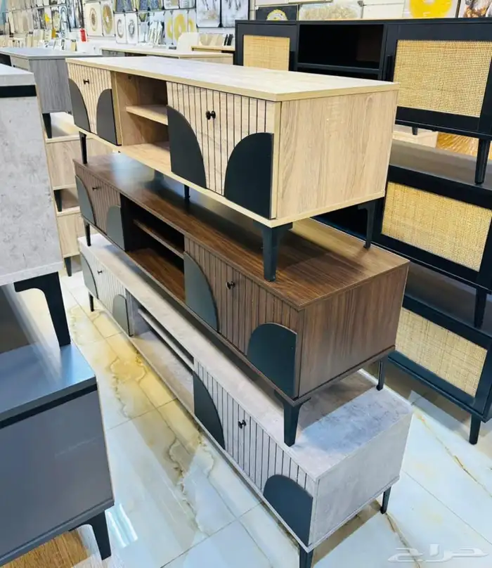 طاولة تلفزيون بتصميم عصري وأنيق 0
