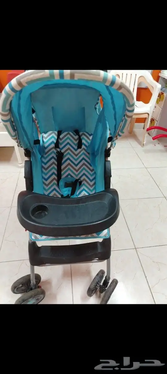 عربيه اطفال ومعها اغراض للبيبي ع السوم 2