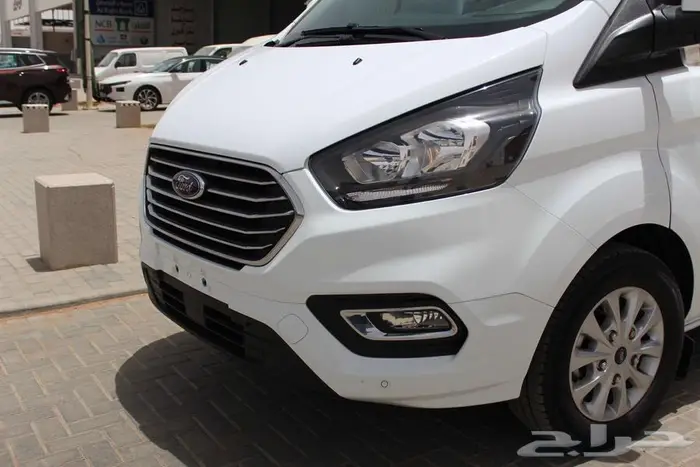 باص فورد 9ركاب ابيض رصاصي اسود 2023 سعره 126500 10