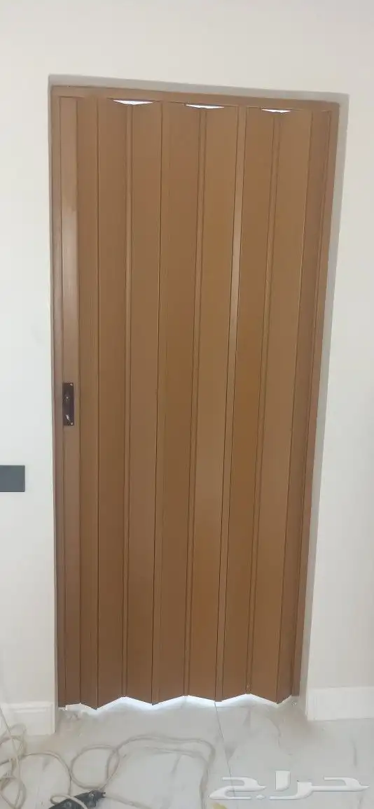 ابواب سحب سحاب جلد وبلاستيك كورديون 0