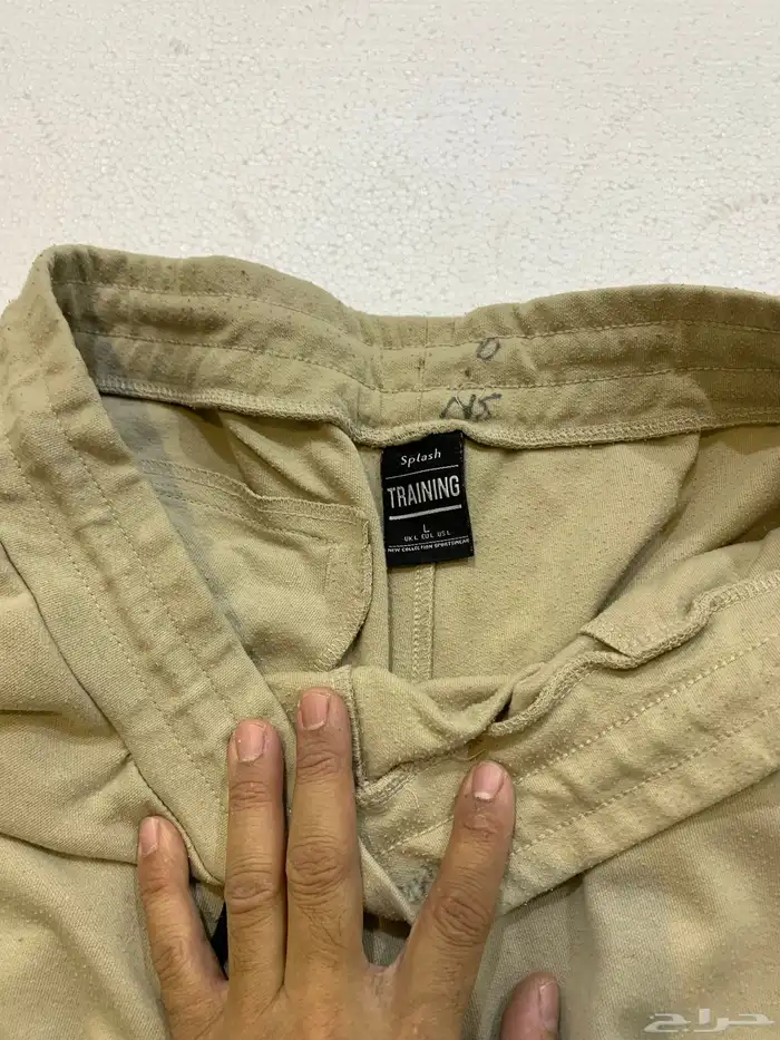 ملابس جنز و قمصان و قبوع و شرابات 87
