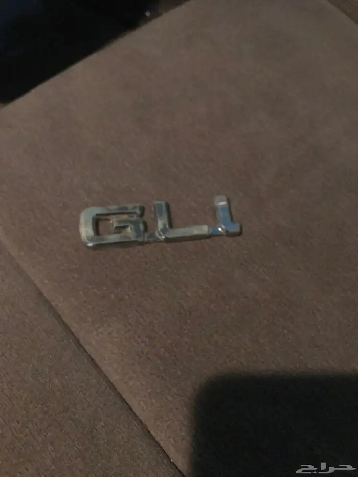 علامة باب شنطه كامري2002 اصلي ذهبي 4